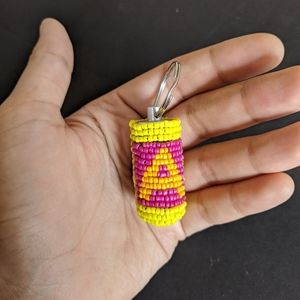 Customizable portable pill case letter keychain